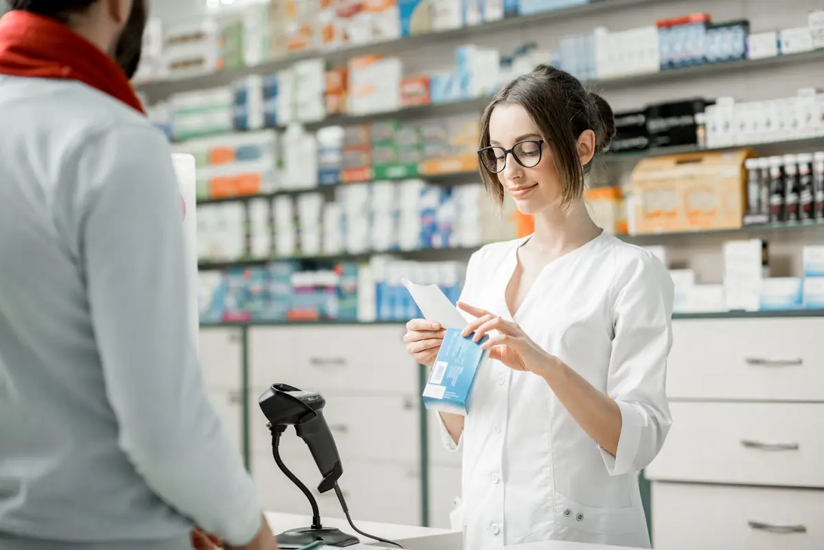 Pharmacist dispensing a prescription